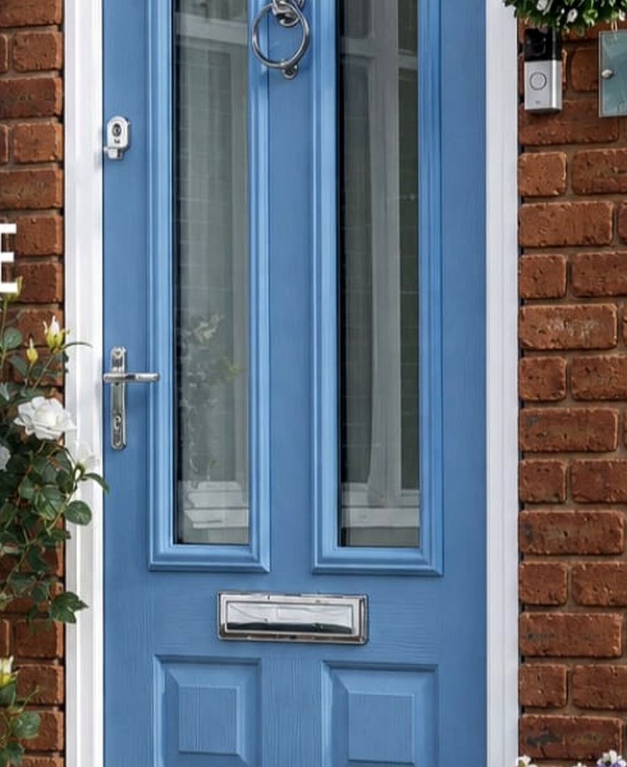 Premium blue composite door with brickwork